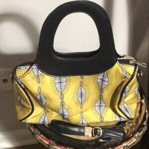 Medium size handbag with removable shoulder strap.